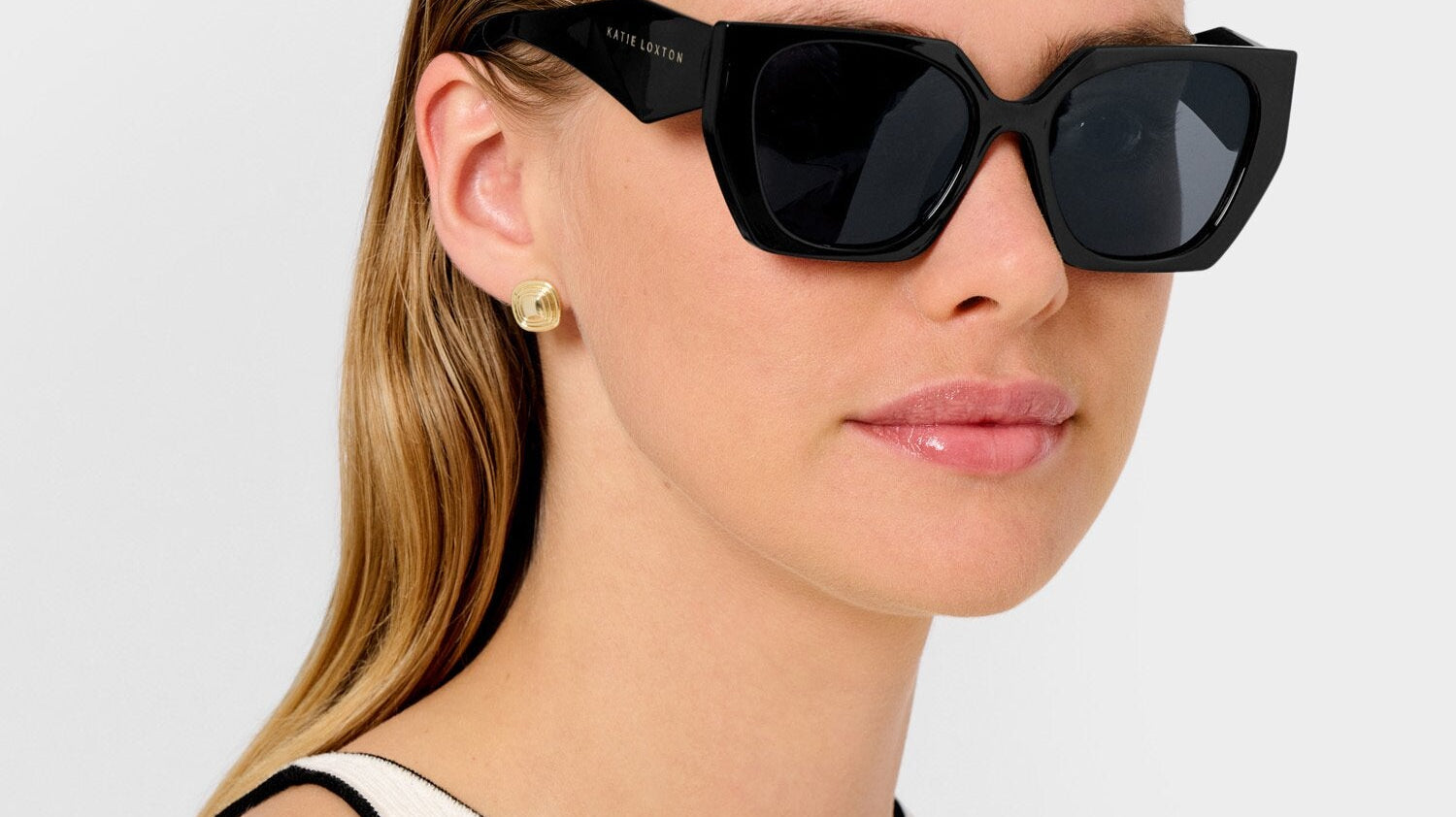 Sun, Style, and Surf: Katie Loxton’s Sunglasses Are Summer’s Must-Have