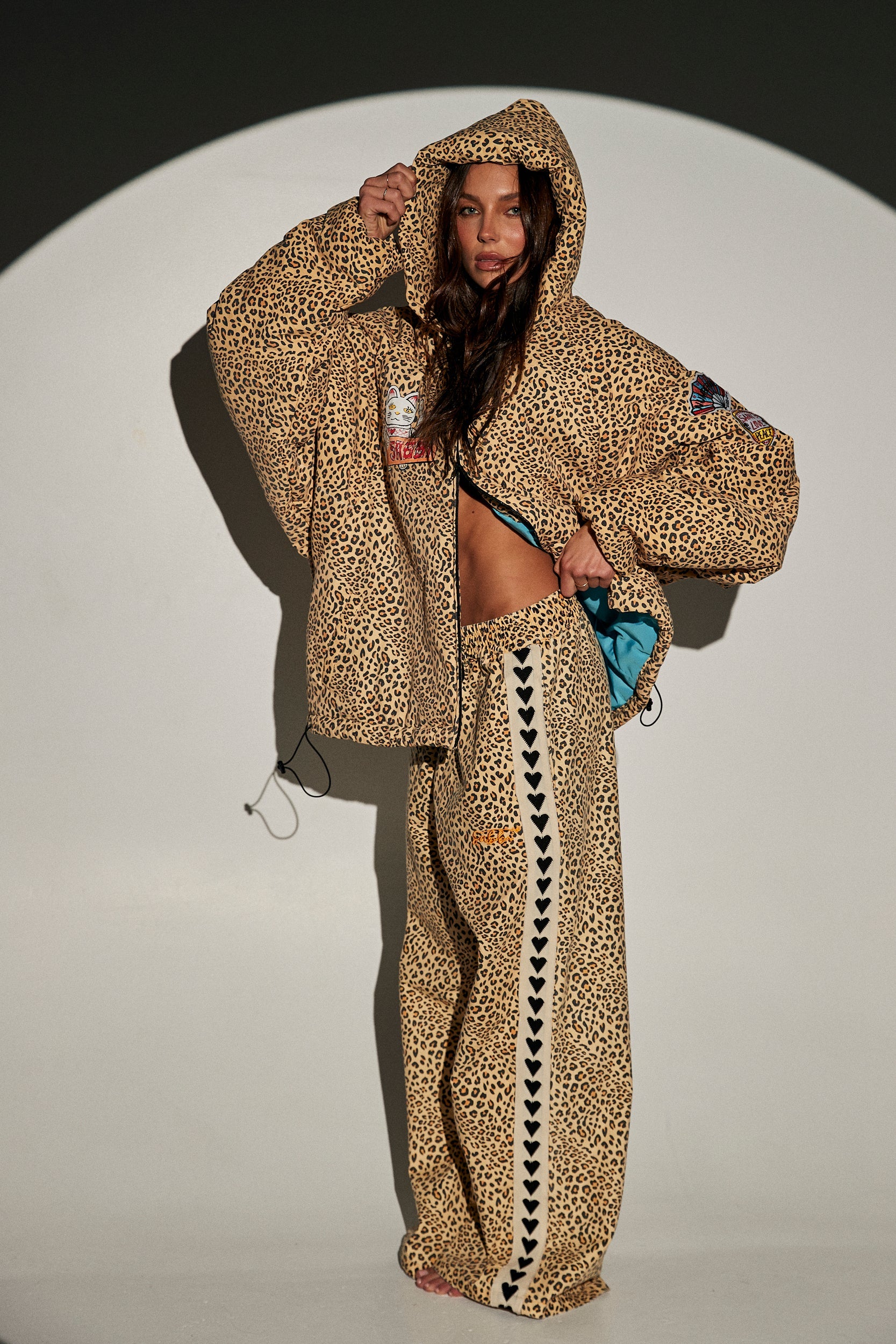 sabbi leopard cheetah big cat energy puffer tracksuit