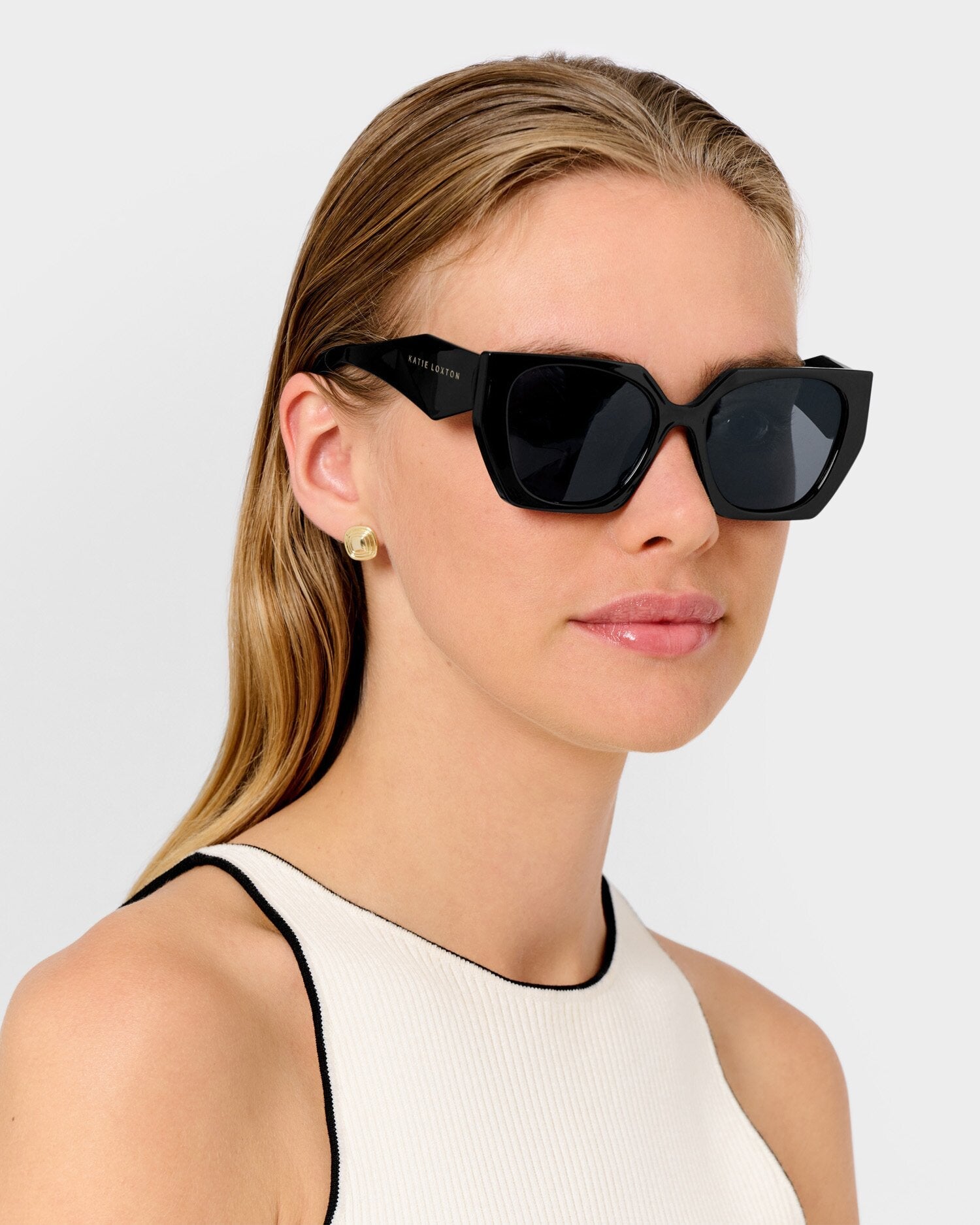 Sun, Style, and Surf: Katie Loxton’s Sunglasses Are Summer’s Must-Have
