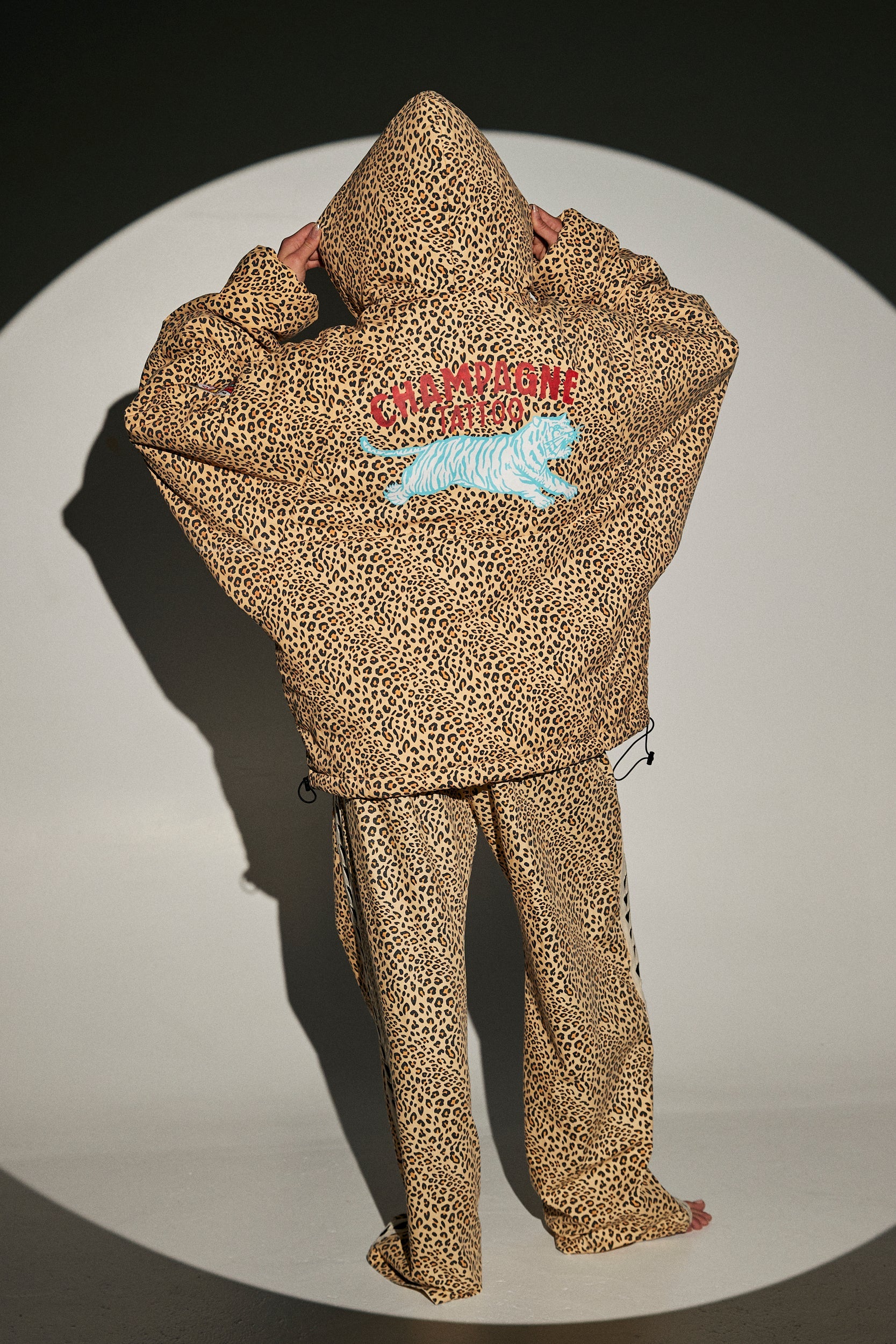 back of sabbi big cat energy puffer jacket