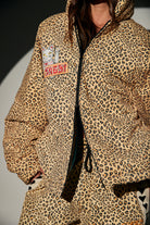 big cat energy puffer modelled half zipped sabbi