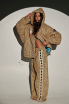 sabbi leopard cheetah big cat energy puffer tracksuit